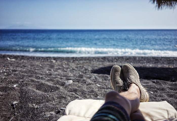 Man enjoying sitting in the shore